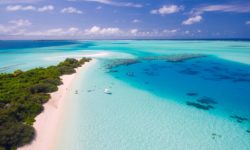 Palme e mare turchese negli atolli meridionali delle Maldive